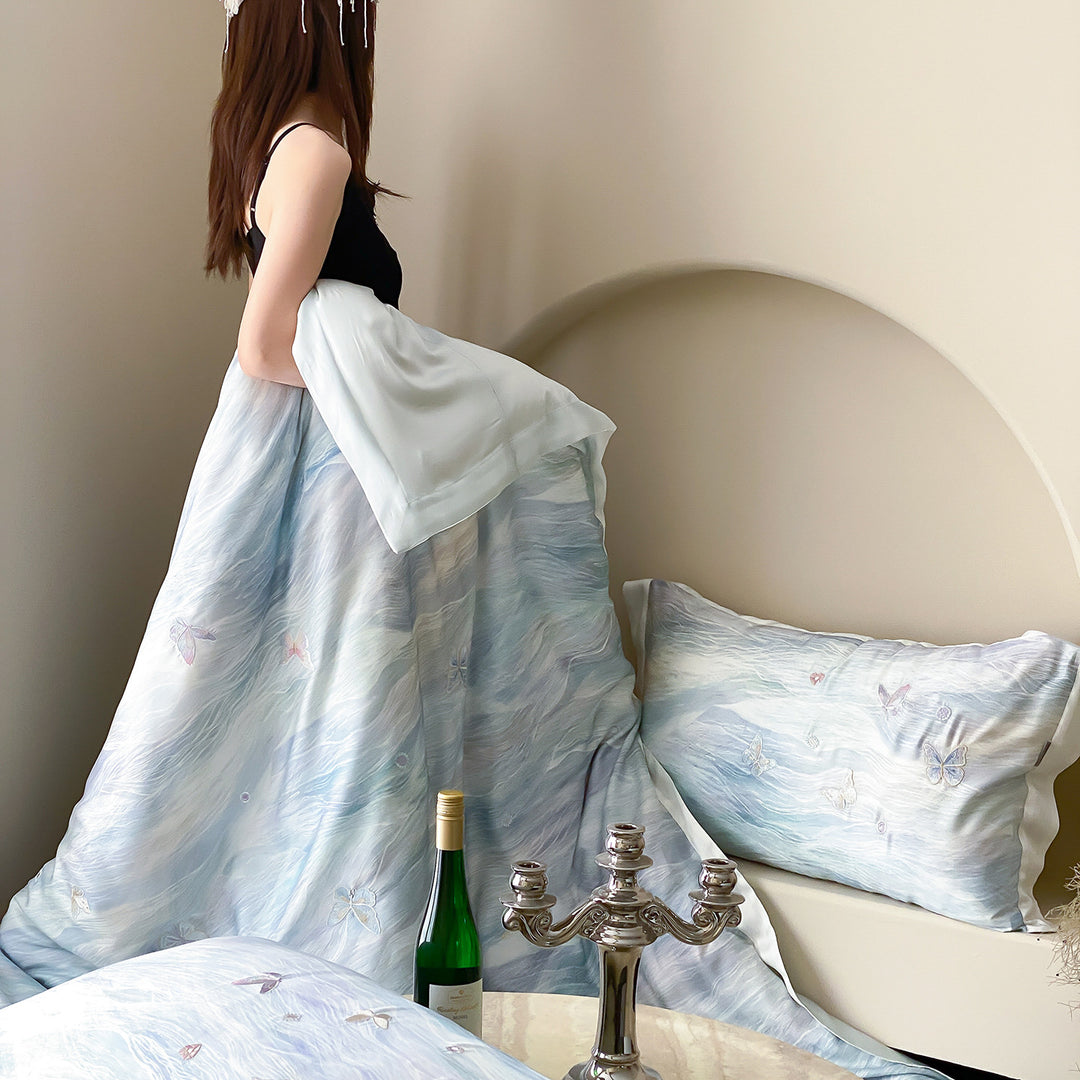 Elegant satin bedding set with watercolored gradient and 3D butterfly embroidery