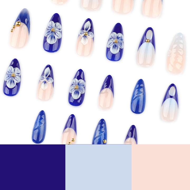 Artistic nail art with floral accents and glitter embellishments Stornfield