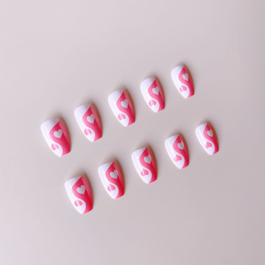 Artificial nails with heart motif and floral accents Stornfield