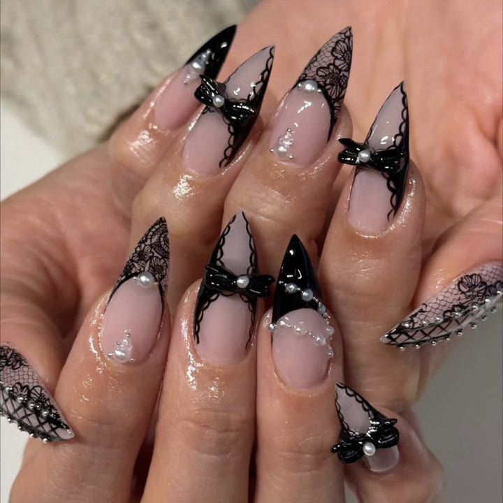 Artful stiletto nails with glitter accents Stornfield