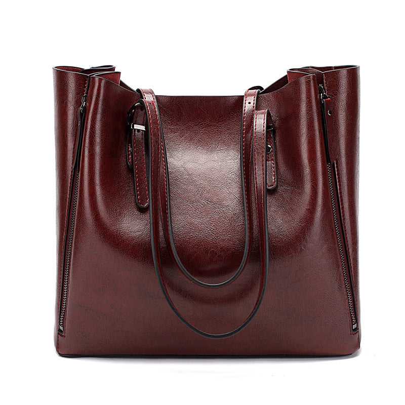 Versatile Leather Tote Bag with Zippered Pockets