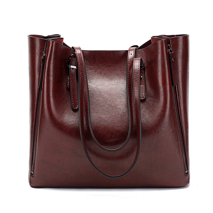 Versatile Leather Tote Bag with Zippered Pockets