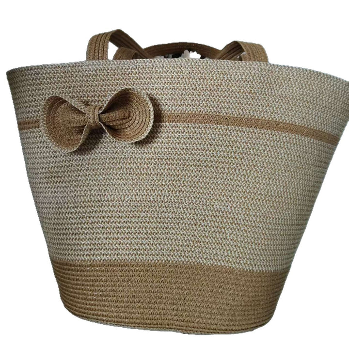 Elegant straw bag with decorative bow closure Stornfield