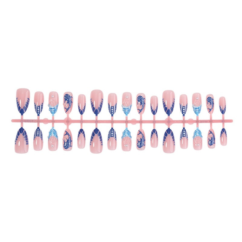 Acrylic nail set with elegant designs and glamorous accents Stornfield