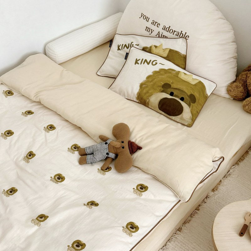 Children's bedding set in futon style with embroidered puppy motifs and cuddle pillow