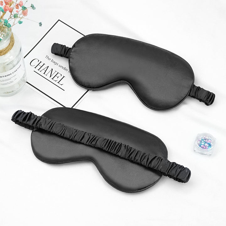 Women's breathable satin eye mask with ergonomic curvature, soft padding and gathered anti-slip band Stornfield