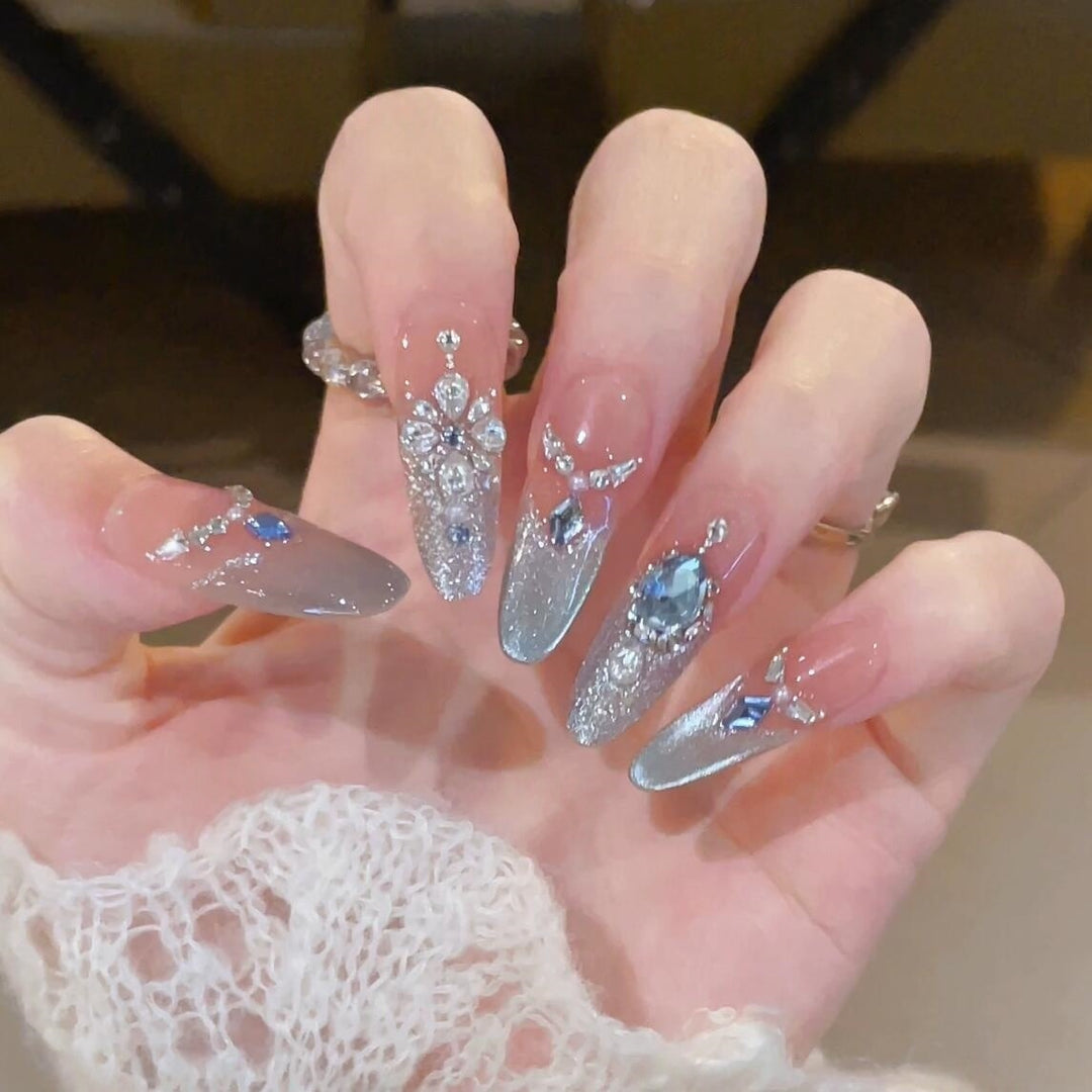 Glamorous artificial nails with sparkling rhinestone accents Stornfield