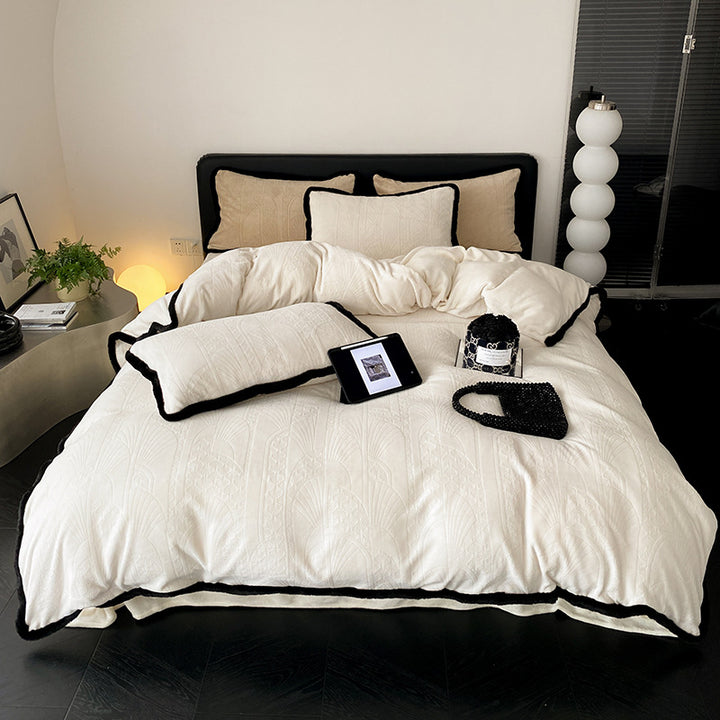 Quilted luxury bed set made of cotton blend with relief pattern and velvet trim