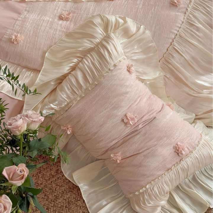 Satin look quilted bedspread with pleated ruffle and 3D flower appliqué