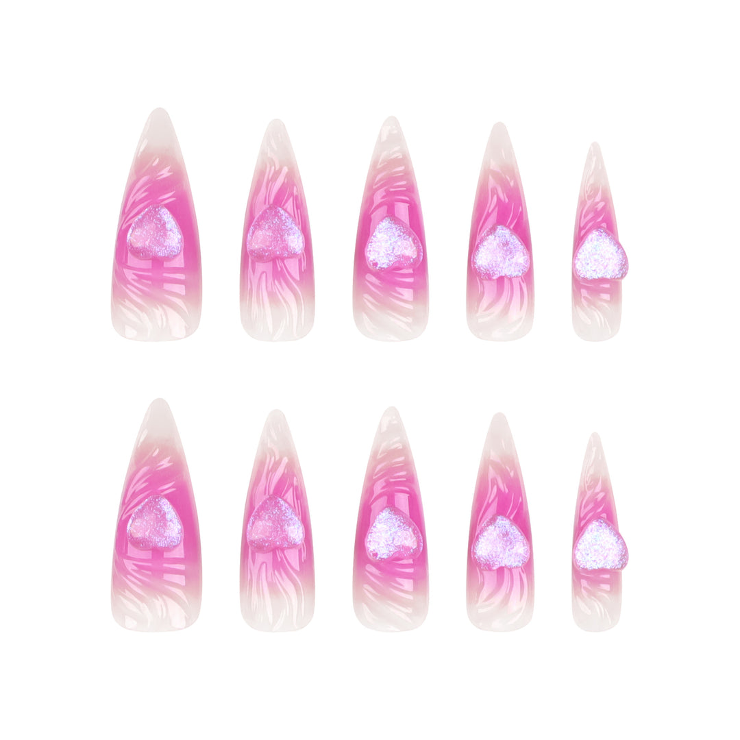 Artistic stiletto nails with heart design and glitter accents Stornfield