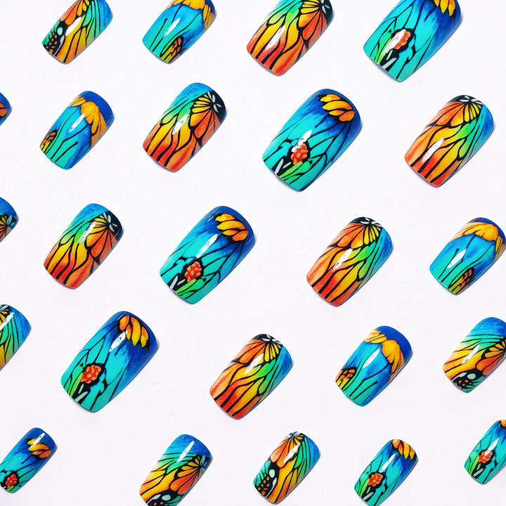 Artificial nails with floral design and bright colors Stornfield