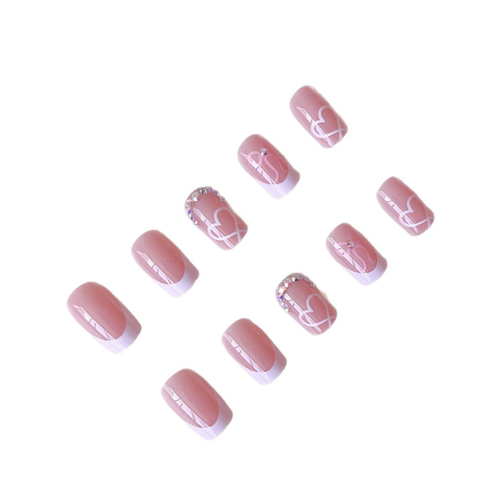 Elegant Nail Art Set with Heart Designs and Rhinestone Details Stornfield