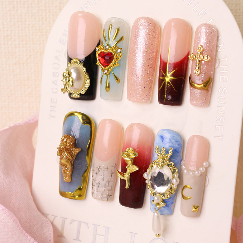 Artificial nail set with artistic decorations and glamorous details Stornfield