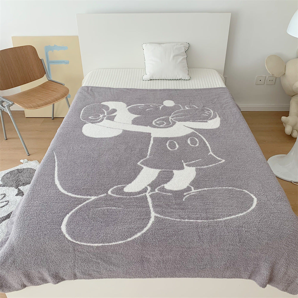 Cozy bedspread made of microfiber with a large woven cartoon motif