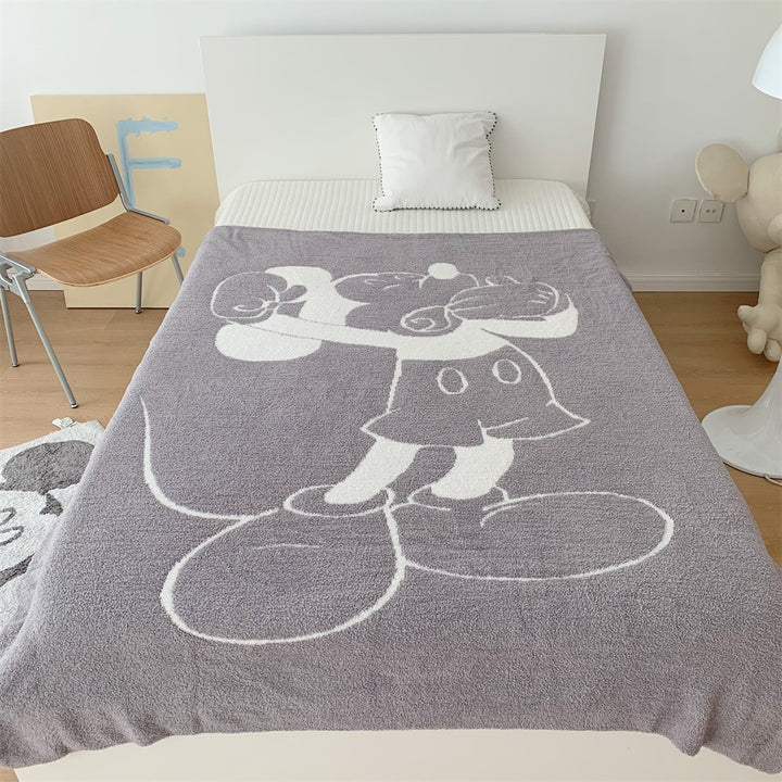Cozy bedspread made of microfiber with a large woven cartoon motif