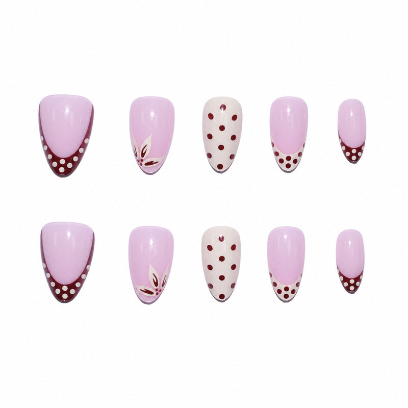 Elegant artificial nails with floral and dotted design Stornfield