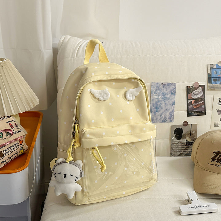 Polka Dot Patterned Backpack with Playful Wing Accents Stornfield