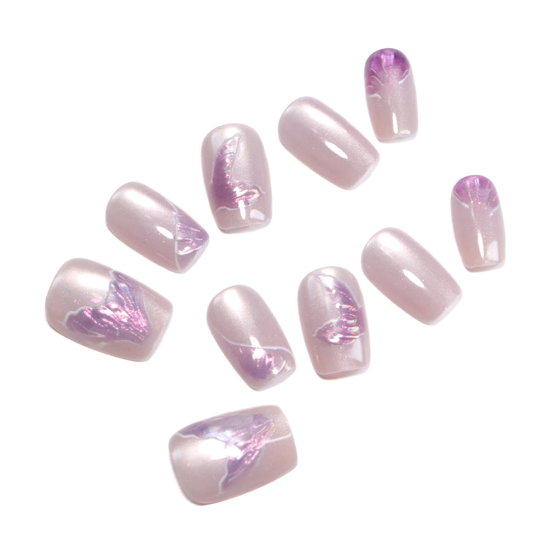 Artfully designed nail extensions with elegant flower motifs Stornfield