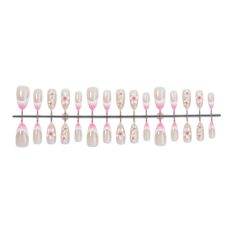 Artificial nail set with floral designs Stornfield