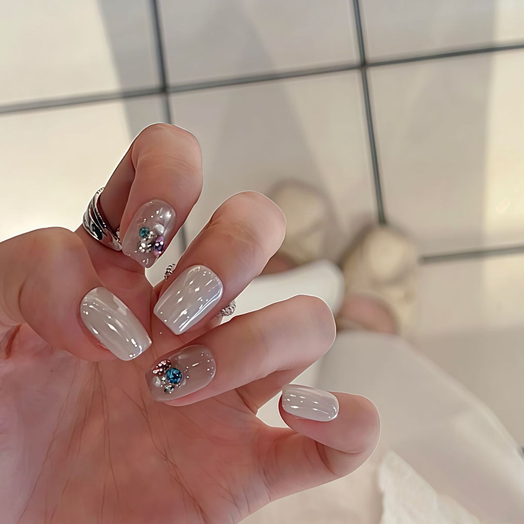 Artificial nails with elegant jewelry accents Stornfield