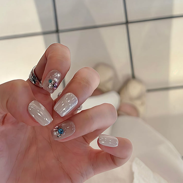 Artificial nails with elegant jewelry accents Stornfield