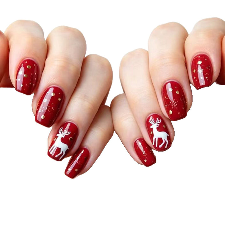 Creative artificial nails with festive reindeer design Stornfield