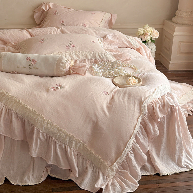 Romantic bedding set made of linen-cotton blend with ruffles and floral embroidery