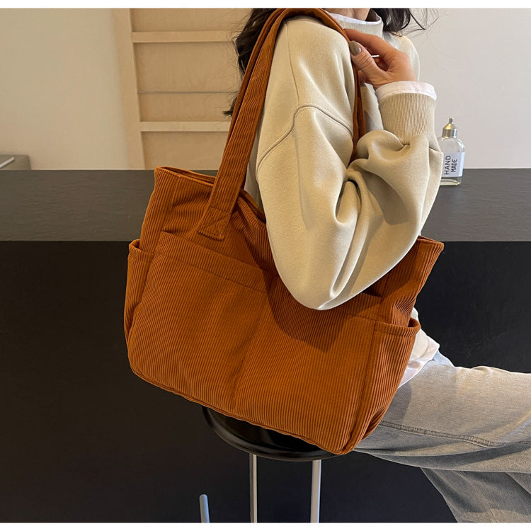 Multifunctional shoulder bag with large outer pockets Stornfield