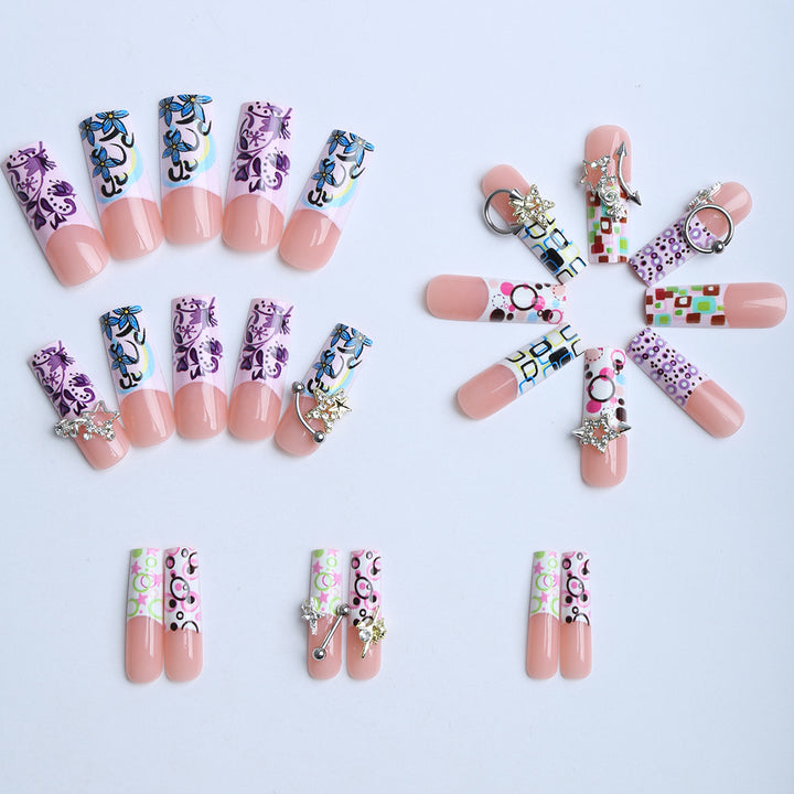 Artificial nails with creative 3D elements and playful patterns Stornfield