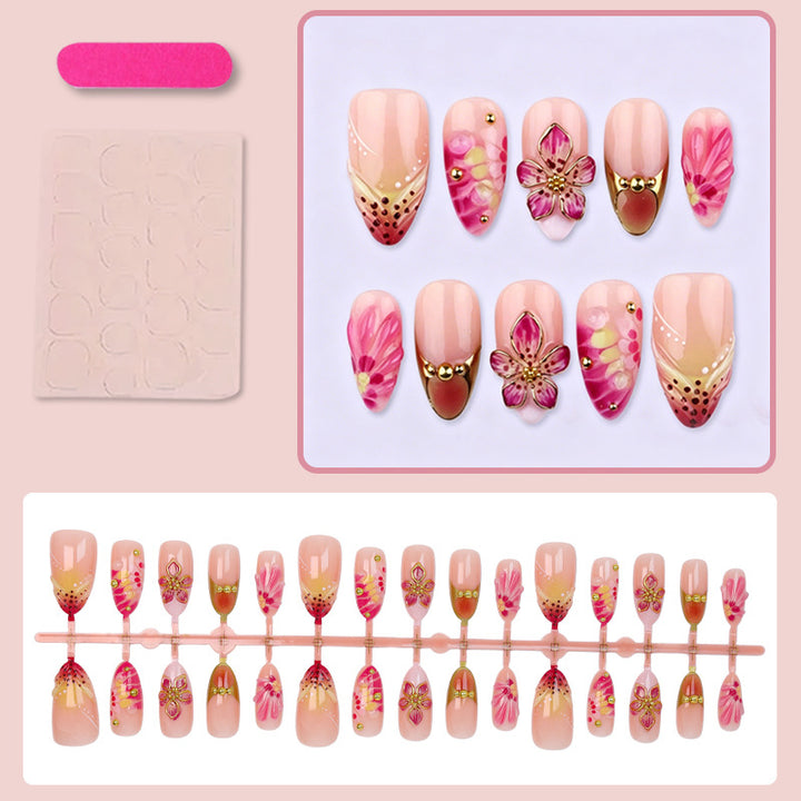 Artificial nail set with floral accents and sparkling details Stornfield