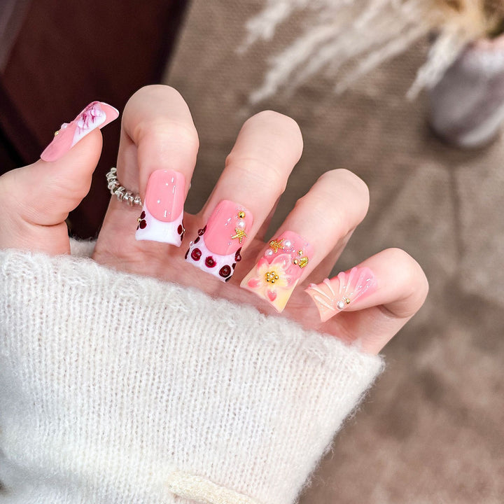 Artistic Acrylic Nail Design with Gem Accents