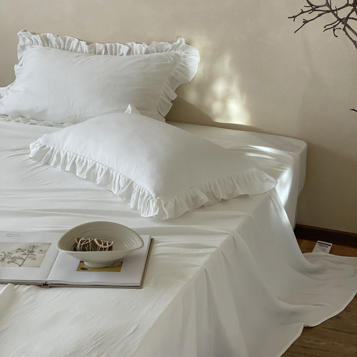 Romantic ruffled bedding set with pillowcases and fitted sheets