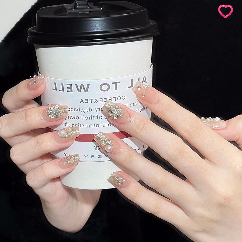 Artificial nail set with elegant pearl and glitter design Stornfield