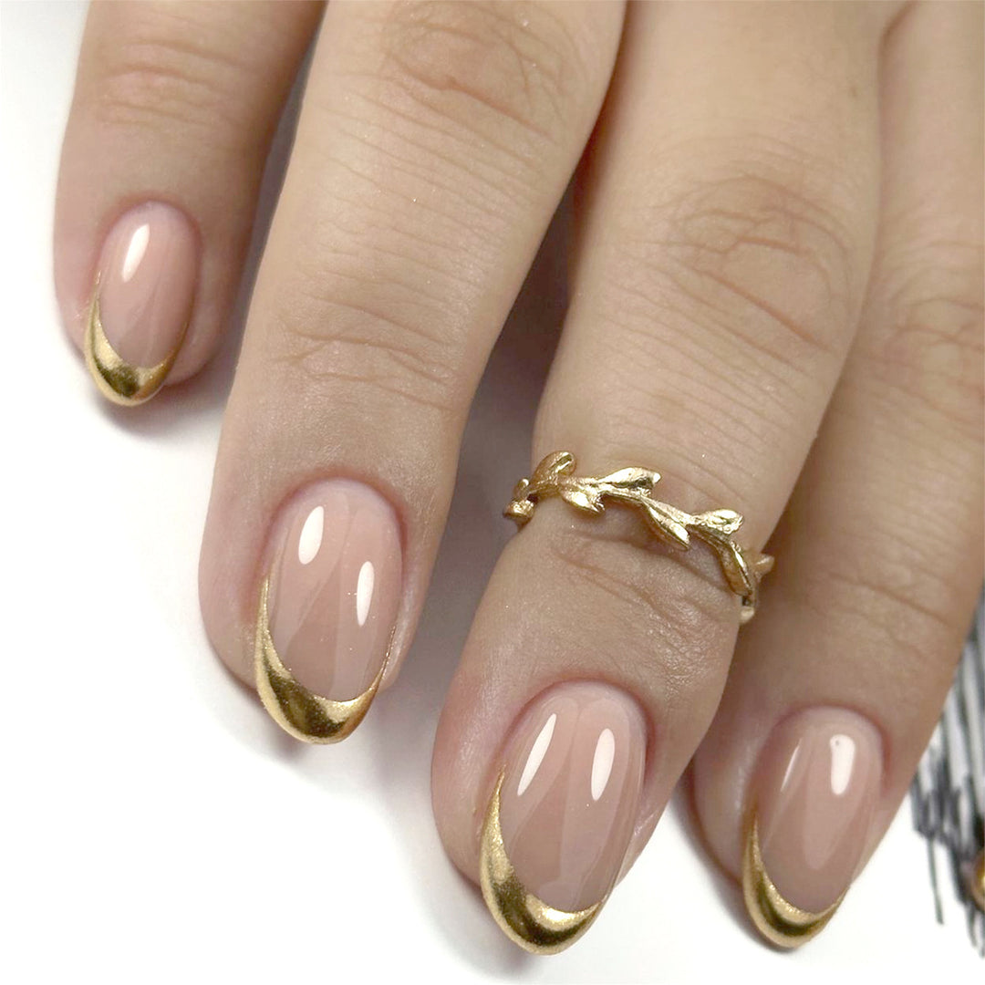 Elegant Gold-Tipped French Nail Art Stornfield