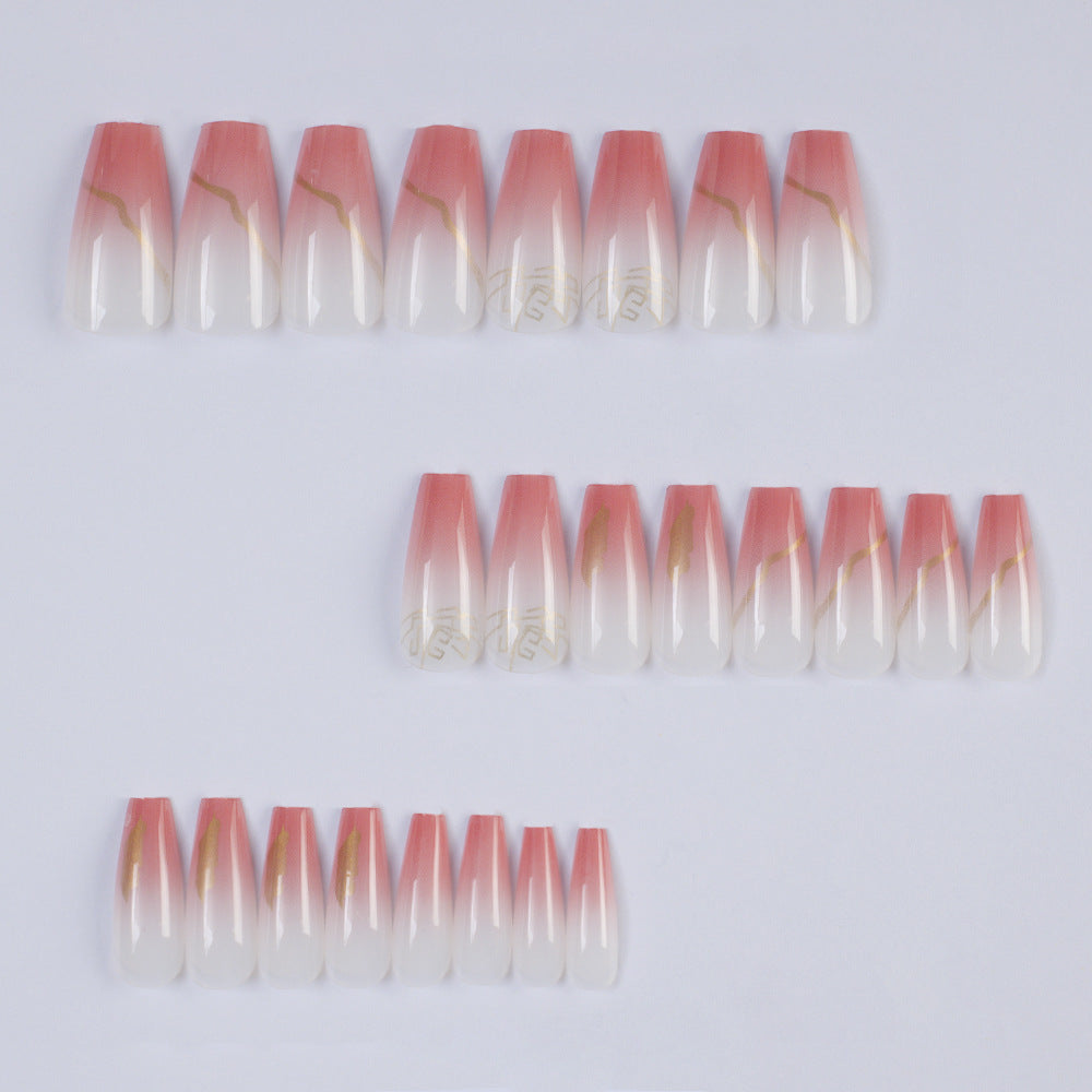 Nail art in an elegant gradient with gold accents Stornfield