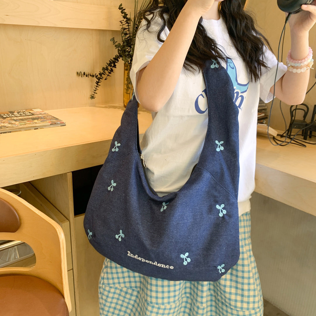 Comfortable shoulder bag with original embroidery motif Stornfield