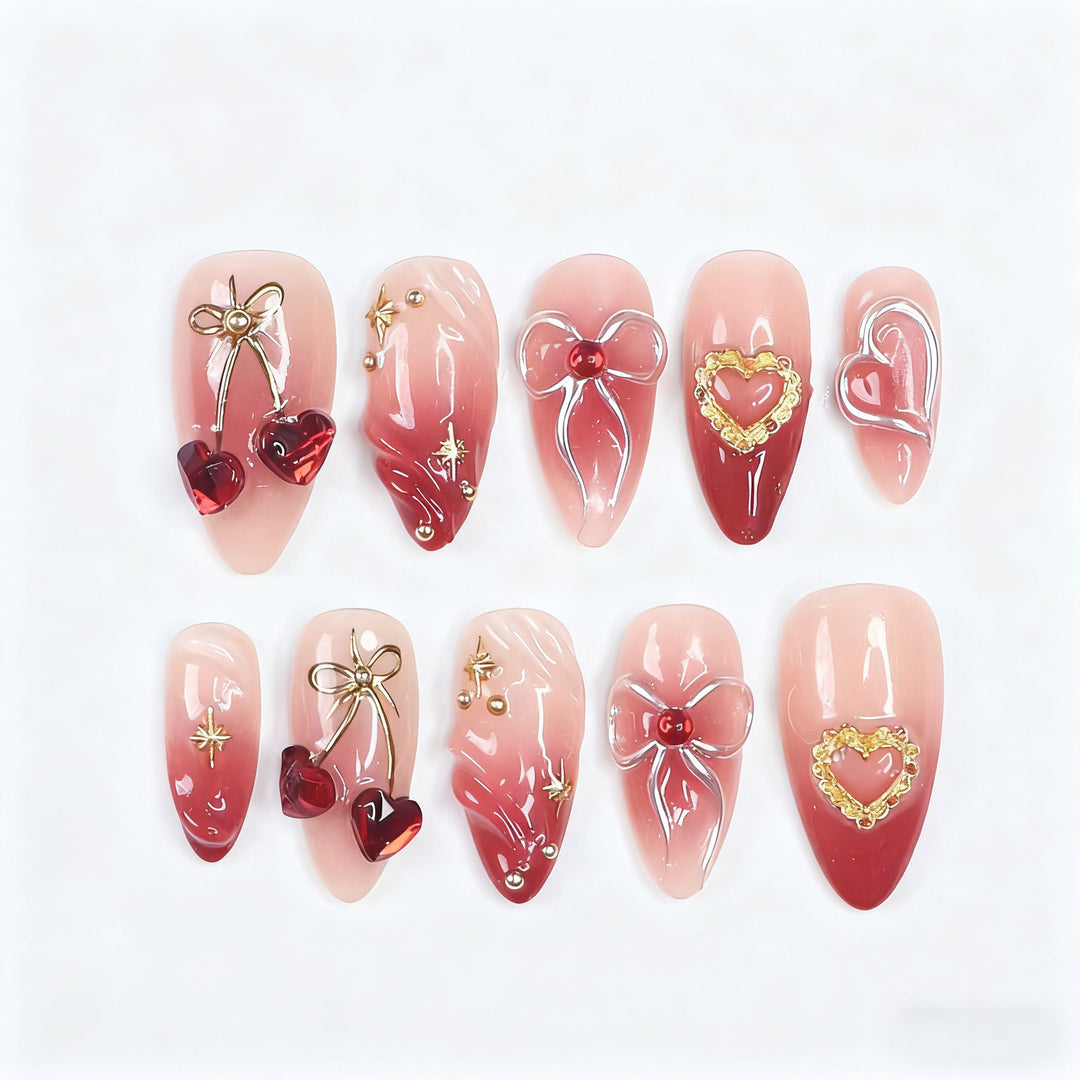 Decorative artificial nails with romantic heart and bow motifs Stornfield