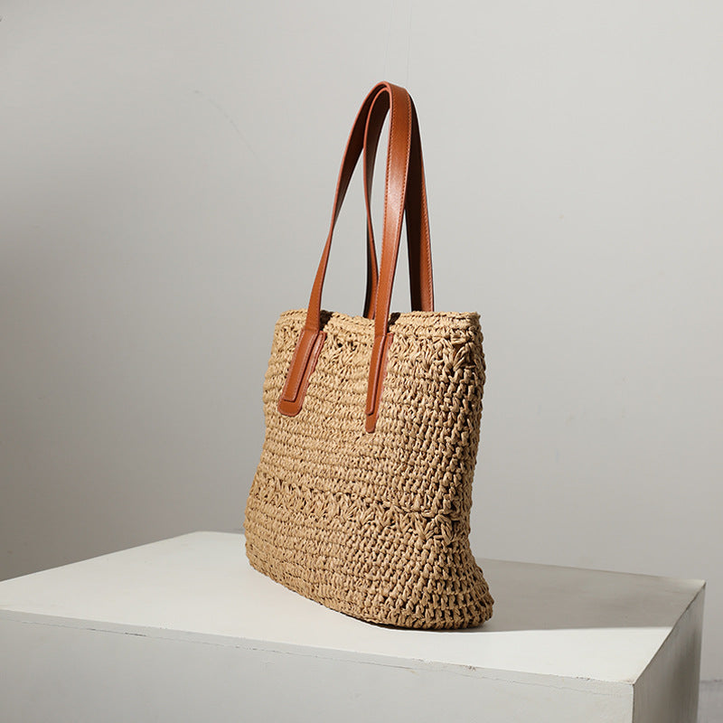Braided straw bag with sturdy leather handles Stornfield