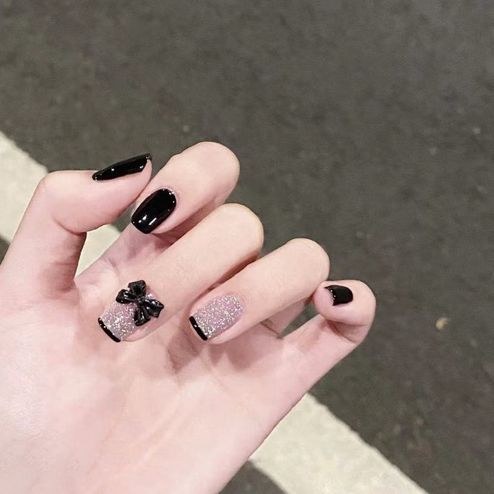 Elegant Stiletto Press-On Nail Set with Decorative Bow Accents Stornfield
