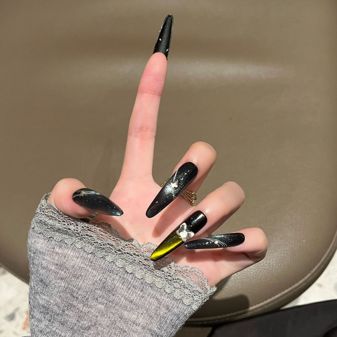 Artistic Stiletto Nail Extensions with Metallic Accents Stornfield