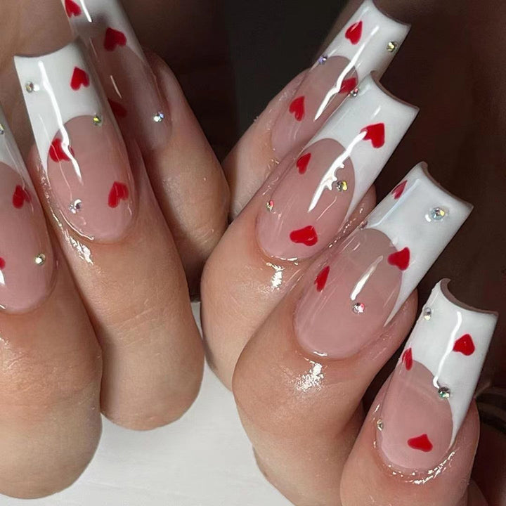 Creative nail art with heart design Stornfield