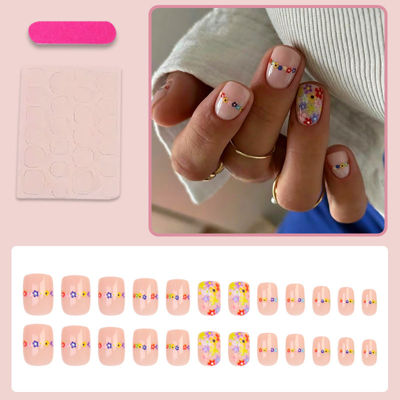 Artificial nail set with floral designs and high-quality embellishments Stornfield