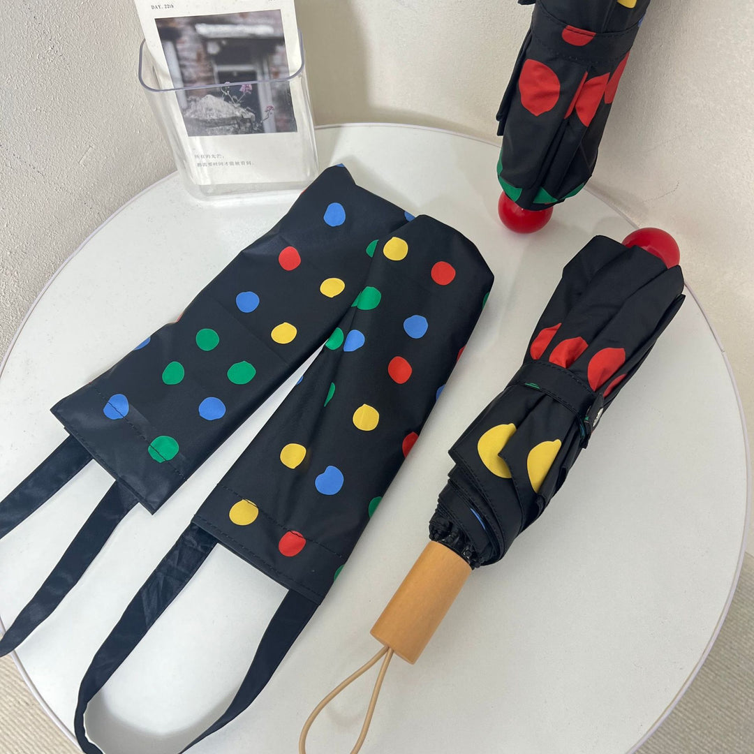 Ladies designer foldable umbrella with colorful polka dot pattern Stornfield