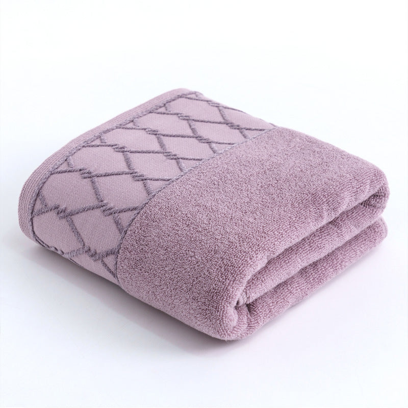 Large premium terry bath towel with decorative structure border