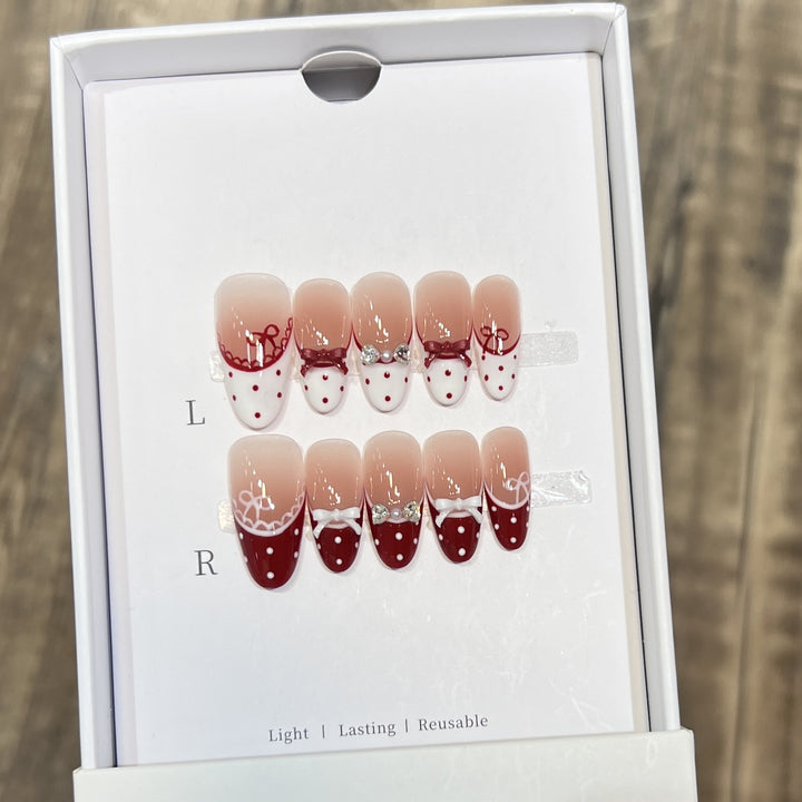 Elegant Reusable Press-On Nails with Artistic Details Stornfield
