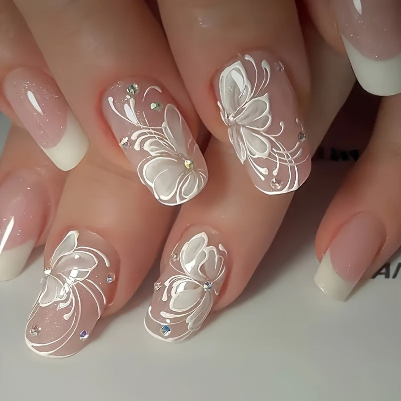Artificial nail set with delicate flower and glitter decoration Stornfield