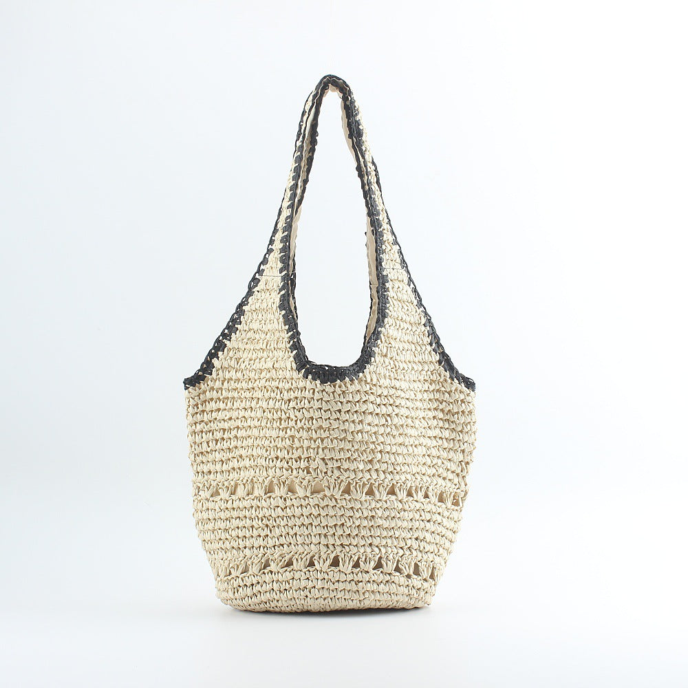 Beach shoulder bag made of hand-woven raffia with elegant lace trims Stornfield