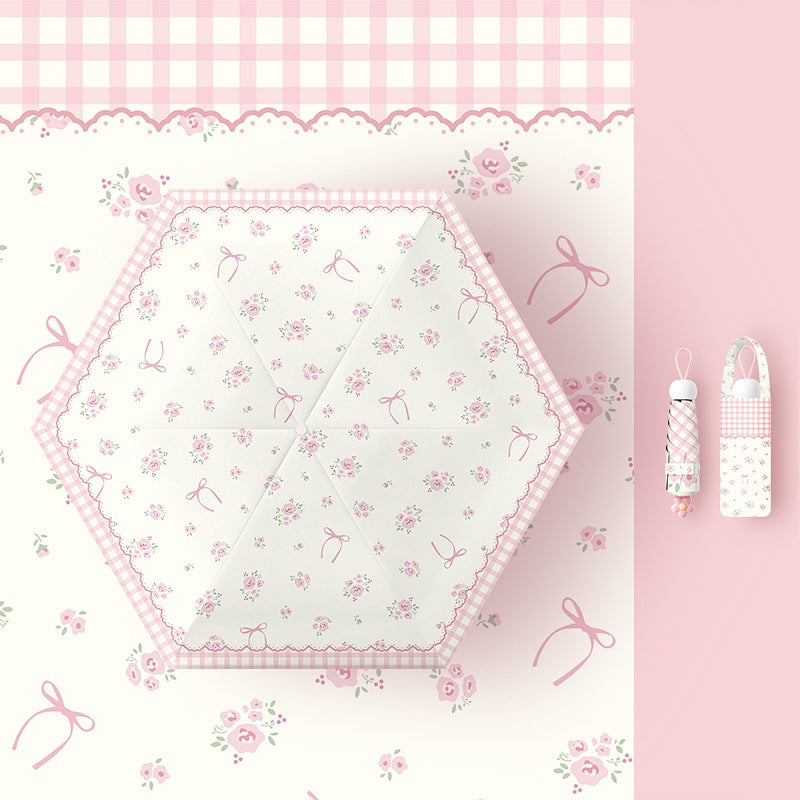 Ladies folding umbrella with playful flower design Stornfield