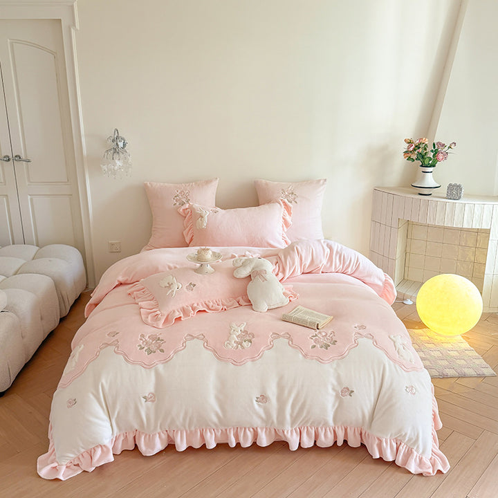 Luxurious bedding set with ruffles and floral embroidery