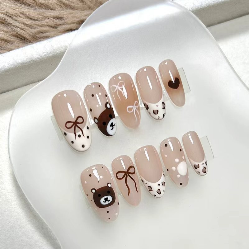 Artificial nails with animal and flower motifs Stornfield